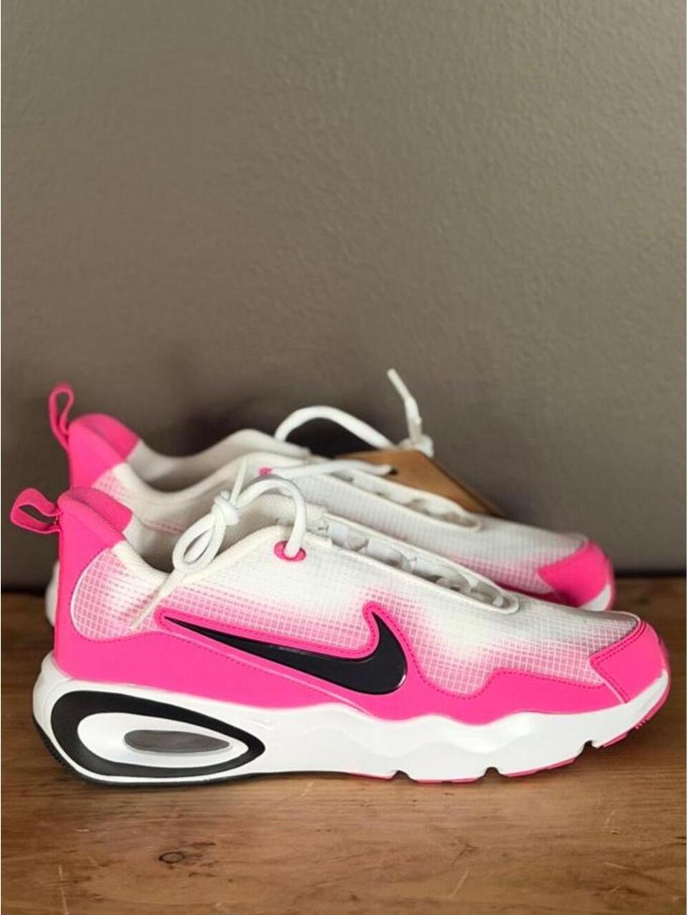 Nike Women's White and Hot Pink Sneakers with Black Swoosh